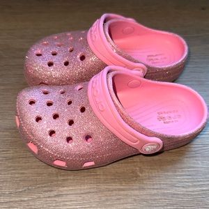 Pink sparkly crocs